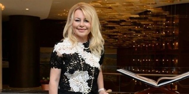 51) Demet Sabancı Çetindoğan